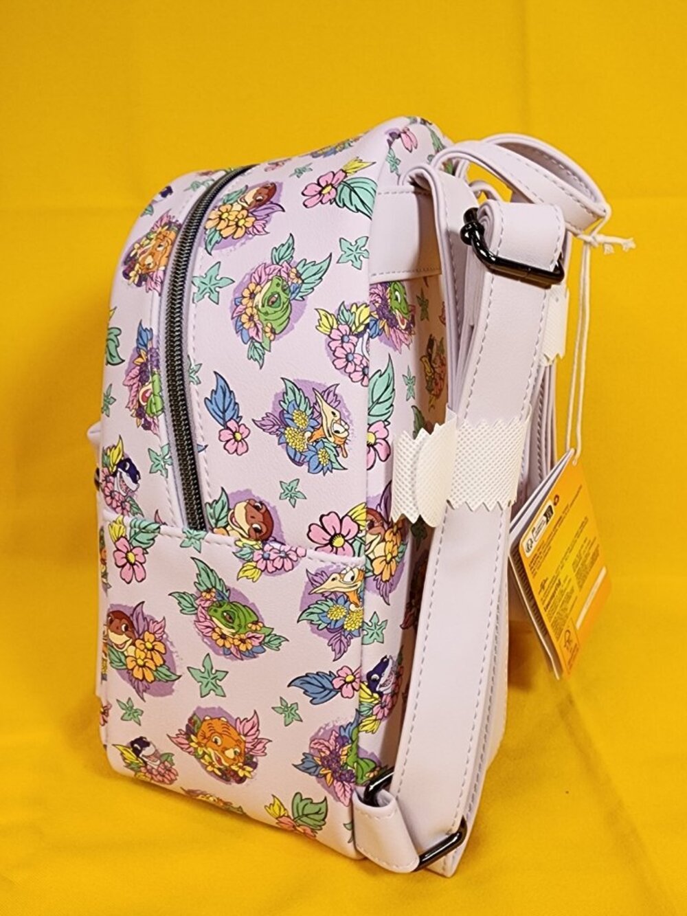 Loungefly The Land Before Time Dinosaurs Floral Purple Soft Tag Mini Backpack - Picture 7 of 11